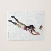 ein afrikanischer amerikanischer Fußballspieler in Puzzle (Horizontal)