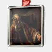 Ein alter Mann in einem Lehnsessel Ornament Aus Metall (Links)