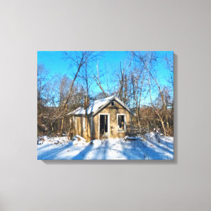 Ein altes Haus in der Schnee-Leinwand Leinwanddruck