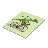 Ein Anabisetia Dinosaurier, der mit dem Fahrrad fä Fliese (Seite)