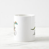 Ein Anabisetia Dinosaurier, der mit dem Fahrrad fä Kaffeetasse (Mittel)