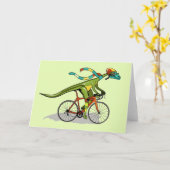 Ein Anabisetia Dinosaurier, der mit dem Fahrrad fä Karte (Gelbe Blume)