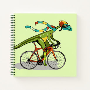 Ein Anabisetia Dinosaurier, der mit dem Fahrrad fä Notizblock