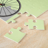 Ein Anabisetia Dinosaurier, der mit dem Fahrrad fä Puzzle (Seite)