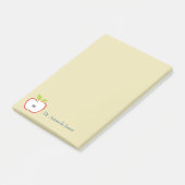 Ein Apfel mit roter Kontur und grünen Blätter Post-it Klebezettel (angewinkelt)