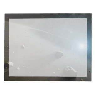 Ein Asteroidengürtel rund um den hellen Star Vega. Notizblock