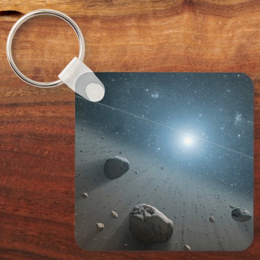 Ein Asteroidengürtel rund um den hellen Star Vega. Schlüsselanhänger (Vorderseite)