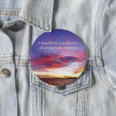 Ein atemberaubender Sonnenuntergang über dem Meer Button (Beispiel)