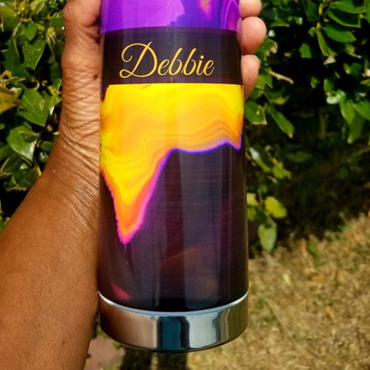 Ein Ausbruch von Lila und gelb Trinkflasche