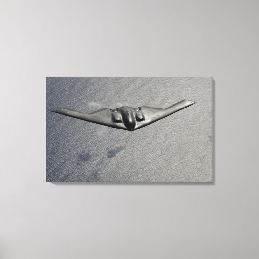 Ein B-2 Spirit fliegt über den Pazifik Leinwanddruck (Vorderseite)