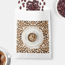 Ein Baby brütet eine Kaffeemaschine. Geschenktütchen