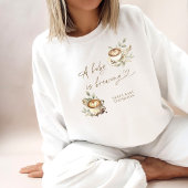 Ein Baby brütet weißes Sweatshirt | Kaffee