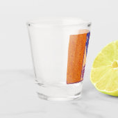 ein Bild eines orangen und blauen Musters Schnapsglas (Links)