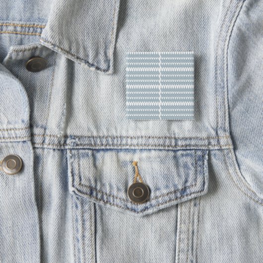 ein blau-weißes Muster mit weißem Hintergrund Button (Beispiel)