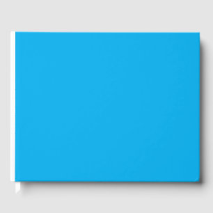 ein blauer Himmel mit einem Flugzeug Gästebuch