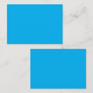Ein blauer Himmel mit einigen verstreuten weißen W Terminkarte