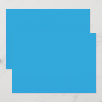 ein blauer Hintergrund mit einer schwarz-weißen Ka Einladung