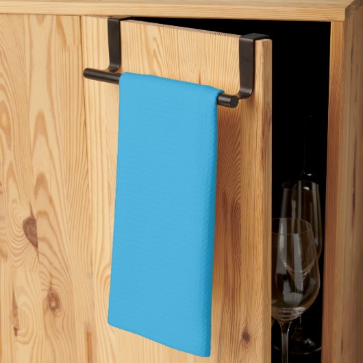 ein blauer Hintergrund mit Geschirrtuch (Drittel gefaltet)