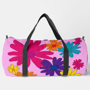 Ein Blumenbeet mit blühenden Blume Duffle Bag