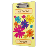 Ein Blumenbeet mit blühenden Blume Klemmbrett (Links)