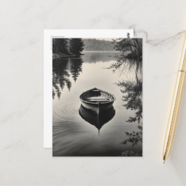 Ein Boot im Fluss Postkarte
