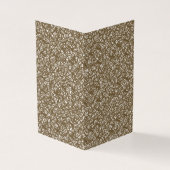 Ein brauner Teppich mit einem geometrischen Motiv  (Vorderseite)