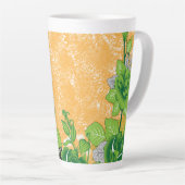 Ein dekoratives Motiv mit verziertem Grün und Ora Milchtasse (Rechte Ecke)