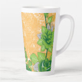 Ein dekoratives Motiv mit verziertem Grün und Ora Milchtasse (Rechts)