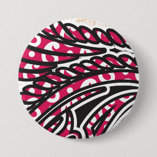 Ein dekoratives Paisley-Design mit lebendigem Rot Button