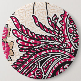 Ein dekoratives Paisley-Design mit lebhaftem Rot u Button