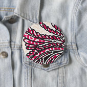 Ein dekoratives Paisley-Design mit lebhaftem Rot u Button (Beispiel)