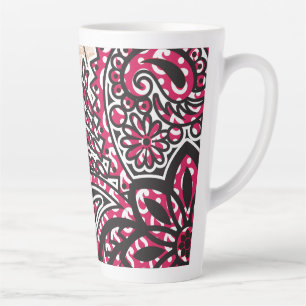 Ein dekoratives Paisley-Design mit lebhaftem Rot u Milchtasse