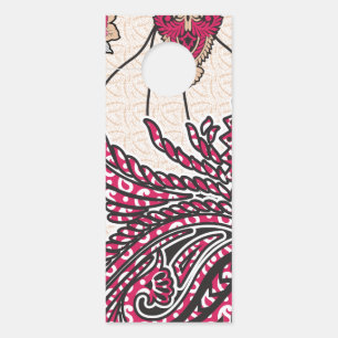 Ein dekoratives Paisley-Design mit lebhaftem Rot u Türanhänger