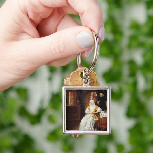 Ein Doktor Visiting eine junge Dame in einem Schlüsselanhänger (Hand)