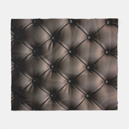 Ein dunkles Lederkissen, aus einem Kindersitz Fleecedecke (Vorderseite (Horizontal))