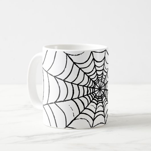 Ein einfaches Spinnennetz - Nah Kaffeetasse (Vorderseite Links)