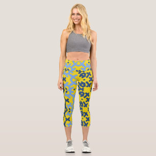 Ein einzigartiges, buntes, ganzflächiges Stoffdruc Capri Leggings