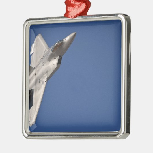 Ein F-22 Raptor-Flugzeug Silbernes Ornament (Links)