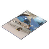 Ein F-6F Hellcat-Weltkriegkämpfer-Flugzeug an Notizblock (Linke Seite)