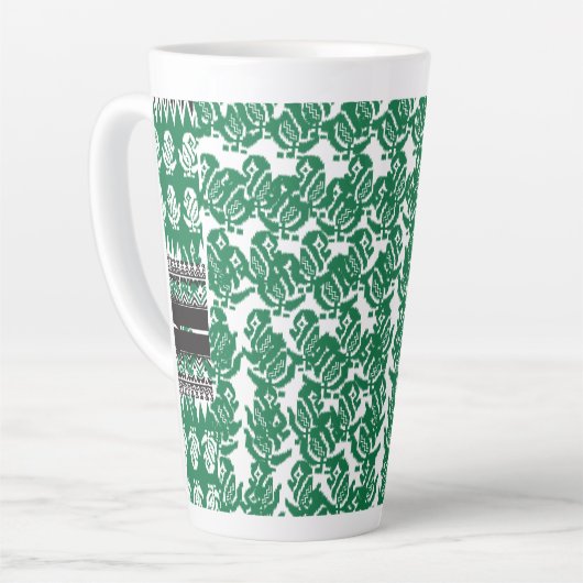 Ein faszinierendes grün-schwarzes Design mit einem Milchtasse (Linke Ecke)