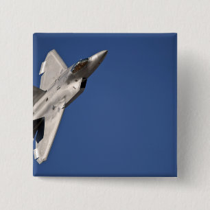 Ein Flugzeug des Raubvogels F-22 Button