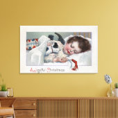 Ein freudiger Weihnachtsjunge schläft mit Welpen Leinwanddruck (Insitu (Wohnzimmer))