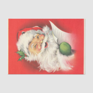 Ein fröhlicher zwinkernd Santa liest seine Liste Seidenpapier