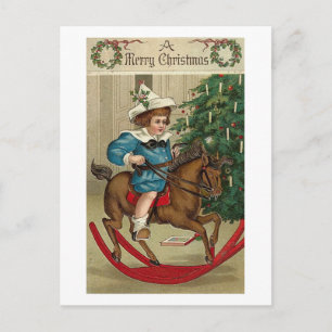 Ein fröhliches Weihnachtskind und Schaukelpferd Feiertagspostkarte