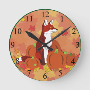 Ein Fuchs im Pumpkinpflaster Runde Wanduhr