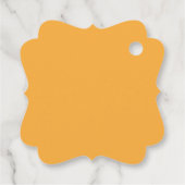 ein gelber Hintergrund mit Geschenkanhänger (Rückseite)