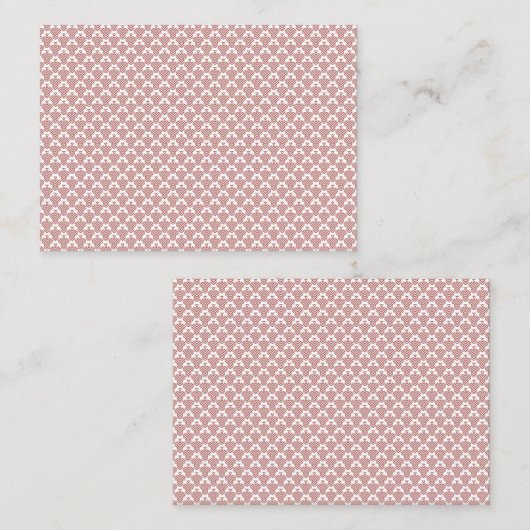 Ein gemusterter Teppich mit roten und braunen Moti Terminkarte (Vorne/Hinten)