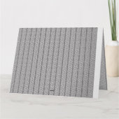 Ein geometrisches, weißes und graues Muster füllt  Karte (Rückseite)