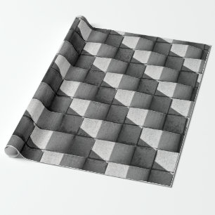 Ein Gesicht der "Vier-Seiten-Pyramide" Skulptur in Geschenkpapier