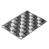 Ein Gesicht der "Vierseitigen Pyramide" Skulptur i Notizblock (Linke Seite)
